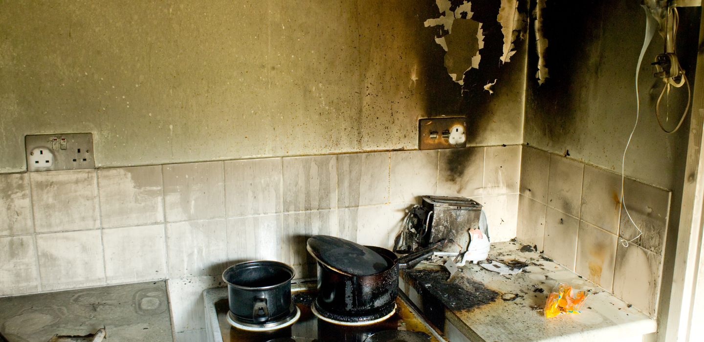 Fire damage has erupted in this home's kitchen